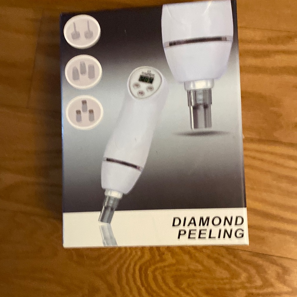 Diamond 17 Portable microdermabrasion vacuum peeling machine.